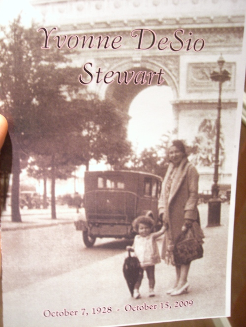 My grandmom (the baby) and her mother in France by the arc de triomphe